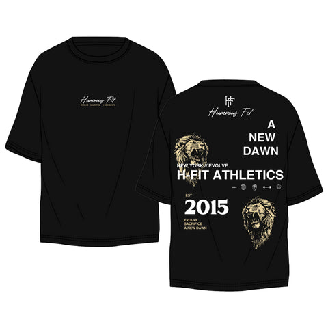 The 2025 HFIT Athletics T-Shirt (Oversized) is a black athletic tee with the Hummys Fit logo in white on the front and lion graphics plus bold motivational text on the back—a perfect gym shirt for your next workout.