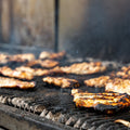 chicken cooking on grill