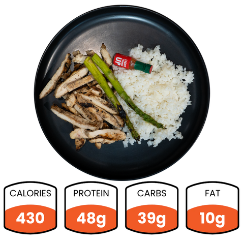 Enjoy a healthy Arnold 2022 Bowl with grilled chicken strips, two asparagus spears, white rice, and green sauce. Ideal for meal prep. Nutrition: 430 calories, 48g protein, 39g carbs, 10g fat.