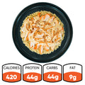 A black plate features the Brookfield Chicken Bowl—tender grilled chicken breast over rice, topped with shredded cheese and crispy fried onions—making it ideal for easy meal prep. Each bowl contains 420 calories, 44g protein, 44g carbohydrates, and 9g fat.