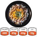 The Cheeseburger Bowl features rice, ground meat, cheddar cheese, pickles, and sauce for a tasty meal. Nutrition: 480 calories, 45g protein, 46g carbs, and 12g fat—ideal for healthy meal prep.