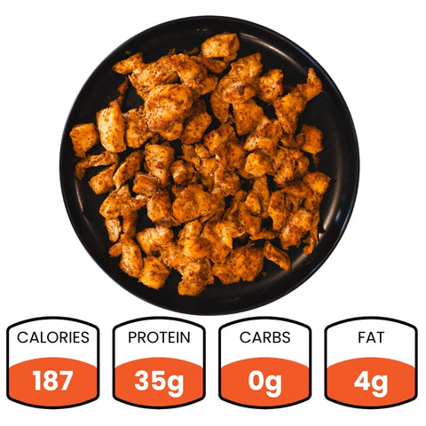 A black plate holds our Competition Approved Chicken Kebab (1lb)—perfect for meal prep. Nutrition below: 187 calories, 35g protein, 0g carbs, and 4g fat per serving.