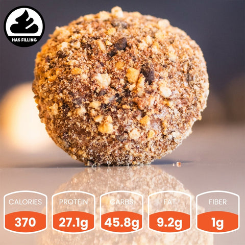 A close-up of a Buffin Muffin in Chocolate Moose Cookie, crumb-coated and creamy inside, shown above nutritional info: 370 calories, 27.1g protein, 45.8g carbs, 9.2g fat, and 1g fiber—perfect for on-the-go snacking.