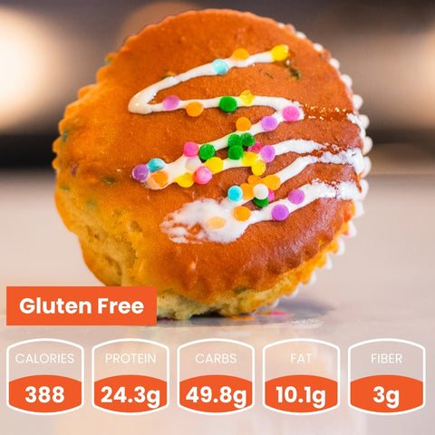 The Buffin Muffin, a gluten-free treat topped with colorful sprinkles and white icing, offers 388 calories, 24.3g protein, 49.8g carbs, 10.1g fat, and 3g fiber—a delicious and nutritious snack for on the go.