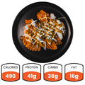 Fit-Fil-A: Black plate with pasta in red sauce, smoked chicken breast, and shredded cheese. Nutrition: 490 calories, 41g protein, 38g carbs, 16g fat—makes for a healthy dinner choice.