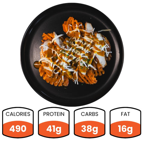 Fit-Fil-A: Black plate with pasta in red sauce, smoked chicken breast, and shredded cheese. Nutrition: 490 calories, 41g protein, 38g carbs, 16g fat—makes for a healthy dinner choice.