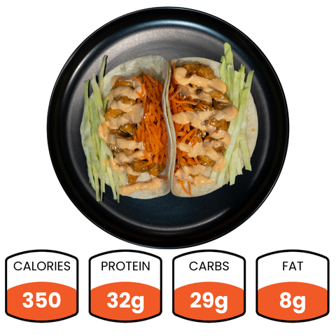Enjoy a healthy dinner with General Tso Tacos (Subscription): two tacos filled with shredded lettuce, carrots, seasoned protein, and creamy sauce. Nutrition per serving: 350 calories, 32g protein, 29g carbs, and 8g fat.
