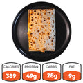 The HFit Signature Fold, a rectangular grilled chicken wrap on a black plate, is shown with nutrition icons: 389 calories, 49g protein, 28g carbs, and 9g fat—a healthy meal prep option.