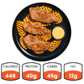 MickieStrips is a black plate with three high-protein chicken strips, waffle fries, and dipping sauce. Nutrition: 448 calories, 40g protein, 45g carbs, and 12g fat—a tasty, satisfying clean meal.