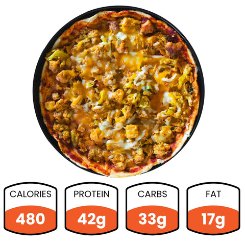 Protein Power Cauli Pizza with cheese and veggies on a cauliflower crust, served on a black tray. Each pizza has 480 calories, 42g protein, 33g carbs, and 17g fat—ideal for anyone wanting a high-protein pizza option.