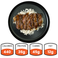 The Teriyaki Flank Bowl offers sliced steak with sauce and sesame seeds over white rice, great for healthy meals or meal prep. It contains 440 calories, 36g protein, 45g carbs, and 12g fat.