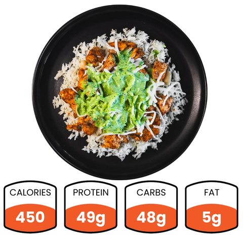 A black plate with jasmine rice, Zeus Bowl chicken, green sauce, and shredded cheese. Below are nutrition stats: 450 calories, 49g protein, 48g carbs, and 5g fat. Try the delicious Zeus Bowl today!.
