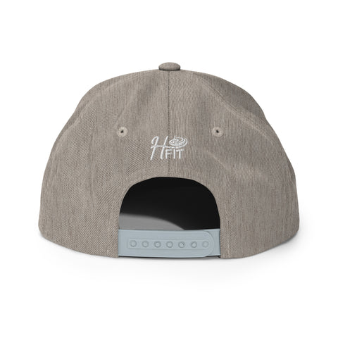 The Heather Snapback Hat in light grey, shown from the back, features a white embroidered H FIT logo above its adjustable snap closure.