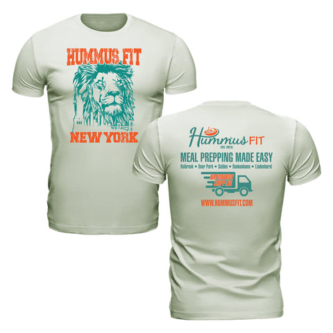 Front and back of the Unisex Hummus Fit New York Citron T-Shirt in light green 100% cotton. Features an illustrated lion and orange “Hummus Fit New York” text on the front; back displays logo, slogan, truck graphic, and website.