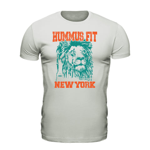 The Unisex Hummus Fit New York Ash T-Shirt is a light gray 100% cotton tee with HUMMUS FIT in orange above a teal lion and the New York skyline, plus NEW YORK in orange below the graphic.