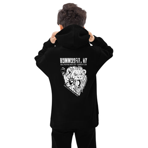 A person facing away adjusts the hood of an Unisex Kids Fleece Hoodie in black, featuring soft, durable fleece and a back graphic of a lion with a microphone and “Hummusfit, NY” text.