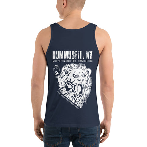 A man wears the Unisex Lions Club Tank Top, made from soft ringspun cotton with a roaring lion and Statue of Liberty torch graphic on the back, plus “HUMMUSFIT NY Meal Prepping Made Easy - HUMMUSFIT.COM.”.
