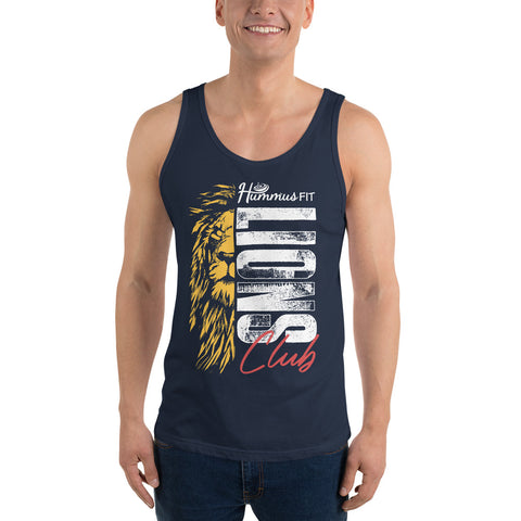 A smiling man wears the Unisex Lions Club Tank Top, featuring a ringspun cotton build, a lion’s face graphic, and “Hummus Fit Lions Club” in bold white and red letters.