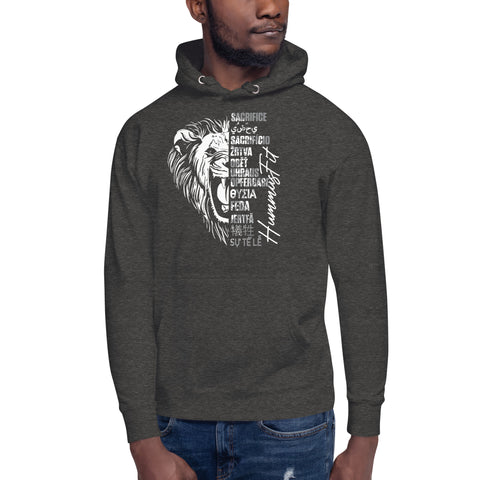 A man wears the Unisex Hoodie, a dark streetwear piece with a white lion graphic and motivational words like “Sacrifice” and “Humanity” on the front, plus a cozy pouch pocket for style and comfort.