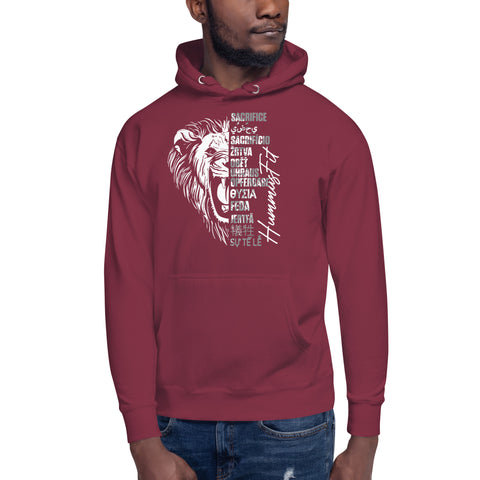 A man wears the Unisex Hoodie in maroon streetwear style, featuring a white lion face graphic, Humility, and sacrifice in multiple languages. This soft hoodie includes a handy pouch pocket for added comfort and style.