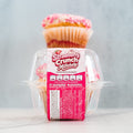 Two Strawberry Crunch Milkshake - Exclusive- 20 muffins from Buffin Bakery are displayed in a clear plastic container, with one muffin placed on top. The label features nutritional information and branding, indicating these as early-access products available exclusively at Hummus Fit.