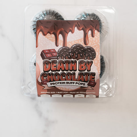 A pack of Protein Buff Pops - Death By Chocolate, featuring a chocolate-themed label with dripping chocolate and truffles, is displayed on a white surface—making it the perfect grab-and-go snack that blends indulgent chocolate cake flavor with the benefits of protein.