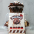 A close-up of the VIP Buffin - Rocky Road shows white marshmallow bits atop a chocolate muffin in a plastic container. Ideal as a macro-friendly snack, its label is blurred in the foreground against a light background.