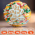 The GINGERBREAD MAN EXCLUSIVE max 25/order is a festive high-protein Buffin, topped with white icing, a gingerbread man, and sprinkles. Nutrition: 370 cal, 26.5g protein, 49g carbs, 8.1g fat, and 1g fiber.