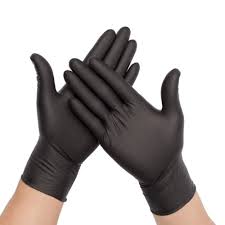 Two hands wearing Nitrile gloves powder free black are held together against a white background, with one hand resting on top of the other.