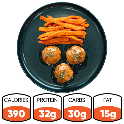 Bourbon Turkey Meatballs are served in sauce with sweet potato fries for a macro-friendly, high-protein meal prep—390 calories, 32g protein, 30g carbs, and 15g fat.