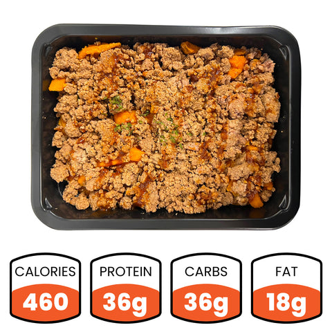 The Broscience Bowl is a black meal tray with cooked ground meat and diced orange vegetables. Nutrition: 460 calories, 36g protein, 36g carbs, and 18g fat—making it a healthy, high-protein meal.