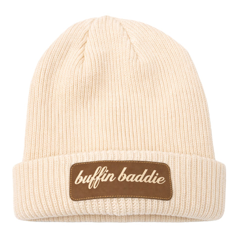 Stay warm and stylish in the Buffin Baddie Brown Patch Beanie—a cream rib-knit beanie with a folded brim and brown "buffin baddie" patch, ideal for cold-weather training or upgrading your athleisure look.