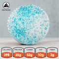 A round, white protein snack with blue sprinkles from Buffin Bakery, called Exclusive-20, is shown. Nutritional info: 398 calories, 25g protein, 52g carbs, 10g fat, and 2g fiber. A symbol indicates this snack has a filling. This delicious treat is part of our early-access products lineup.
