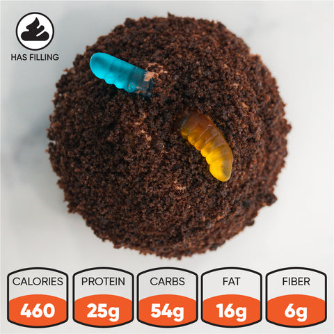 Buffin Muffin Dirt Cake: A chocolate cupcake crowned with two gummy worms and chocolate crumbs—a true throwback dessert. Nutrition icons below show 460 calories, 25g protein, 54g carbs, 16g fat, and 6g fiber. The “has filling” icon appears at the top left.