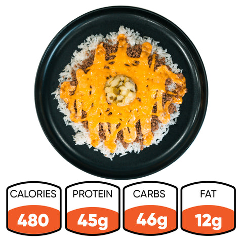 The Cheeseburger Bowl features white rice with ground meat, orange sauce, and diced onions for a hearty gluten-free meal. Nutrition: 480 calories, 45g protein, 46g carbs, and 12g fat.