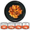 A black plate with cooked Competition Approved Chicken Kebab 1lb pieces—ideal for meal prep. Beneath, icons show: 187 calories, 35g protein, 0g carbs, and 4g fat.