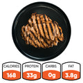 Competition Approved Grilled Chicken 1lb, halal and freshly sliced on a black plate. Perfect for meal prep: 168 calories, 33g protein, 0g carbs, and 3.8g fat per serving.
