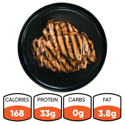 Competition Approved Grilled Chicken 1lb, halal and freshly sliced on a black plate. Perfect for meal prep: 168 calories, 33g protein, 0g carbs, and 3.8g fat per serving.