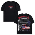 The Liberty Lift Oversized Tee is a black graphic t-shirt with Hummus Fit New York text on the front and a bold back design featuring the Statue of Liberty, American flag, lion, and more—a standout piece of patriotic streetwear.
