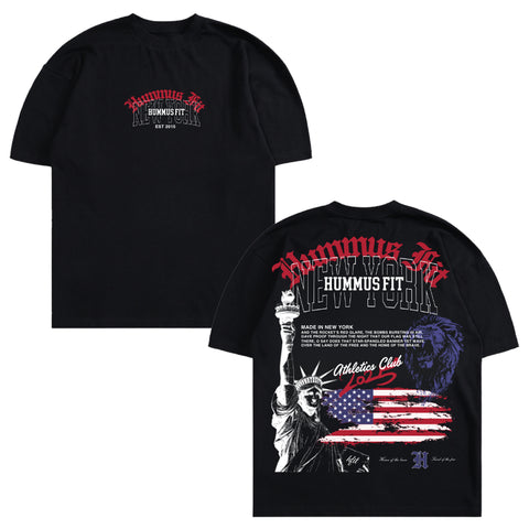 The Liberty Lift Oversized Tee is a black graphic t-shirt with Hummus Fit New York text on the front and a bold back design featuring the Statue of Liberty, American flag, lion, and more—a standout piece of patriotic streetwear.