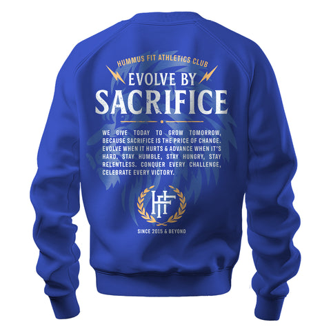 The 2025 Hummus Fit Sacrifice Lion Crewneck Royal Blue features “Evolve by Sacrifice” in bold white lettering on the back, surrounded by motivational text, laurels, and an HF Athletics Club logo. Made with mid-weight fleece for comfort.