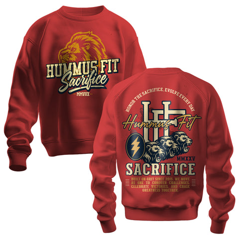 The 2025 Hummus Fit Sacrifice Lion Crewneck Red features mid-weight fleece, bold vintage "Hummus Fit Sacrifice" and lion on the front, plus two lions, a lightning bolt, and motivational text in gold, white, and black on the back.