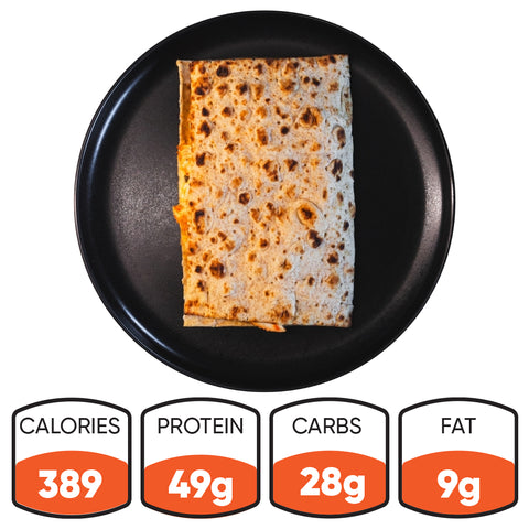 The HFit Signature Fold, a rectangular grilled chicken wrap on a black plate, is shown with nutrition icons: 389 calories, 49g protein, 28g carbs, and 9g fat—a healthy meal prep option.