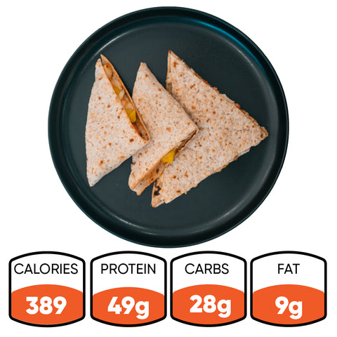 A black plate with three folded tortilla wraps, featuring the HFit Signature Fold. This healthy grilled chicken meal prep provides 389 calories, 49g protein, 28g carbs, and 9g fat.