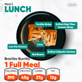 A sliced grilled halal chicken burrito from the Women’s Fat Loss Fall Plan on a black plate with labels for corn, beans, cheese, and tortilla strips, plus nutritional info showing 390 calories, 45g protein, 27g carbs, and 12g fat.