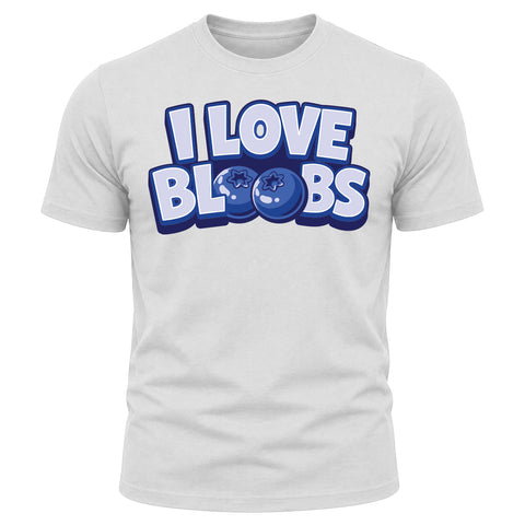 The I Love Bloobs T-Shirt - White features bold text with the word “BLOOBS” where the two Os are illustrated as cartoon blueberries with small faces, inspired by Buffin Bakery’s signature blueberry treats.