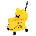 The mop bucket features a yellow body, black wringer and handle, four black caster wheels, and a "Caution Wet Floor" label in red and black on the side.