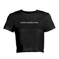 The Buffin Baddie Club Definition Crop Tee in black features “buffin baddie club” in white lowercase across the chest—ideal for streetwear fans.