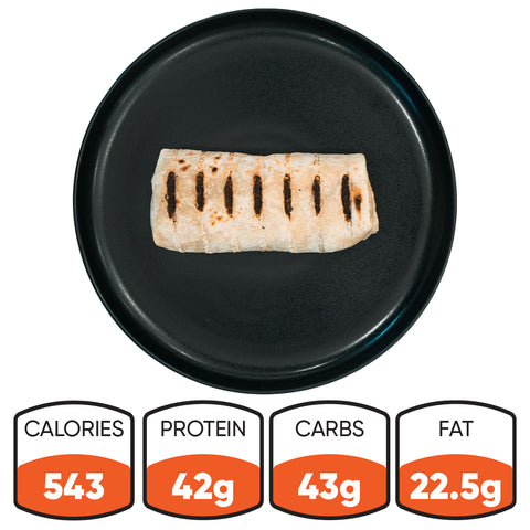 The "Golden Arches" Mac Daddy Wrap on a black plate: 543 calories, 42g protein, 43g carbs, and 22.5g fat—a high-protein, macro-friendly lunch or meal prep option.