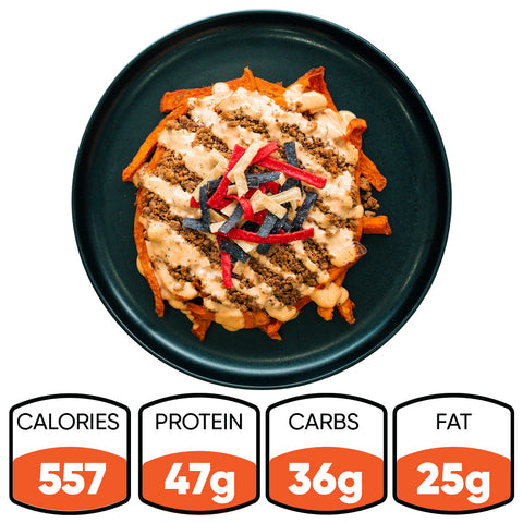 The Nacho Average Bowl features sweet potato fries, lean ground beef, chipotle sauce, and crispy tortilla strips. Nutrition: 557 calories, 47g protein, 36g carbs, 25g fat.